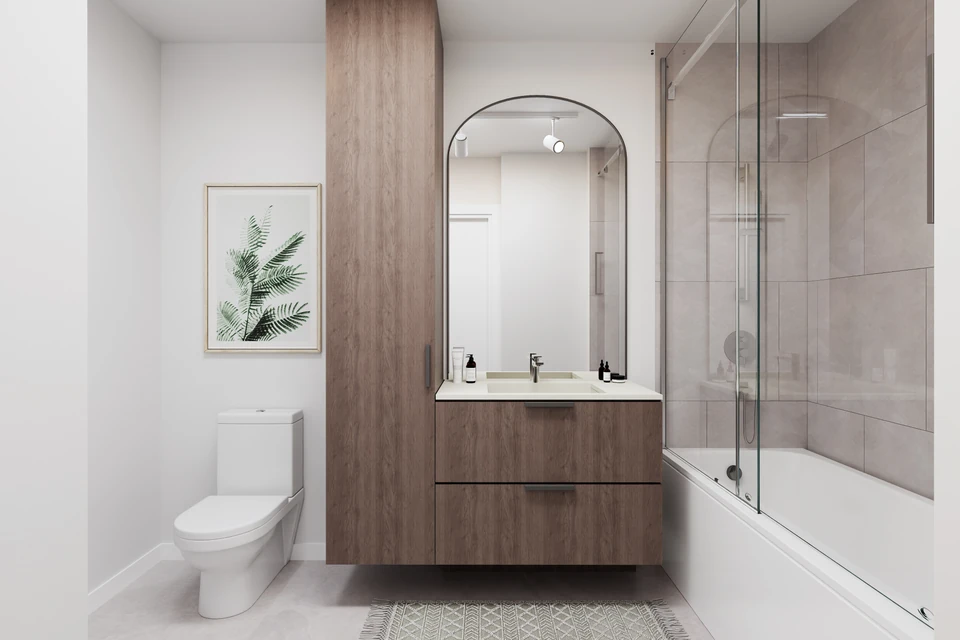 Salle de bain avec baignoire et meuble-lavabo
